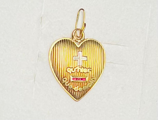 Pendentif Augis d’amour « + qu’hier - que demain » en or 18 carats serti de rubis calibrés.
